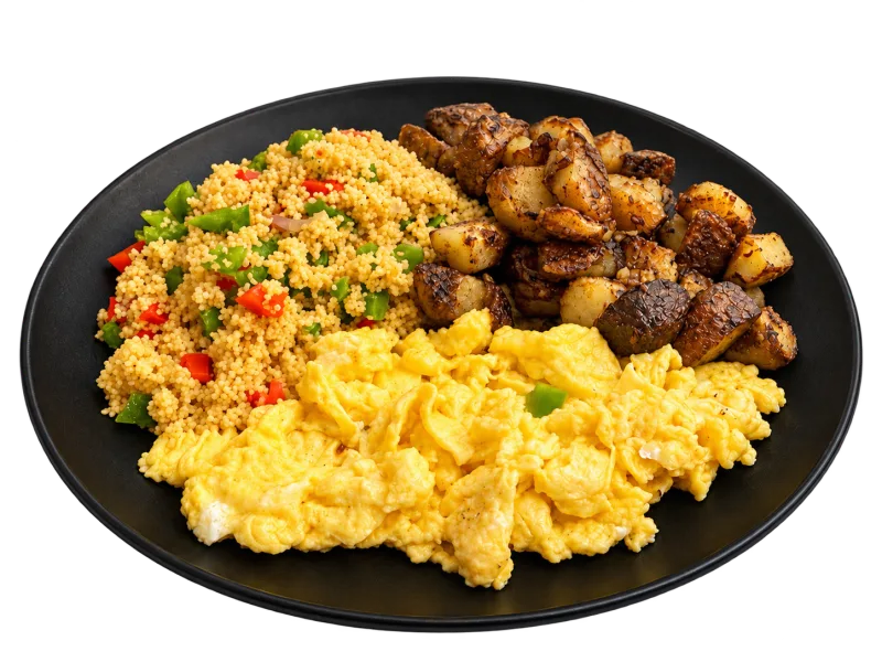 Mazar Cafe breakfast plate with eggs, potatoes and couscous